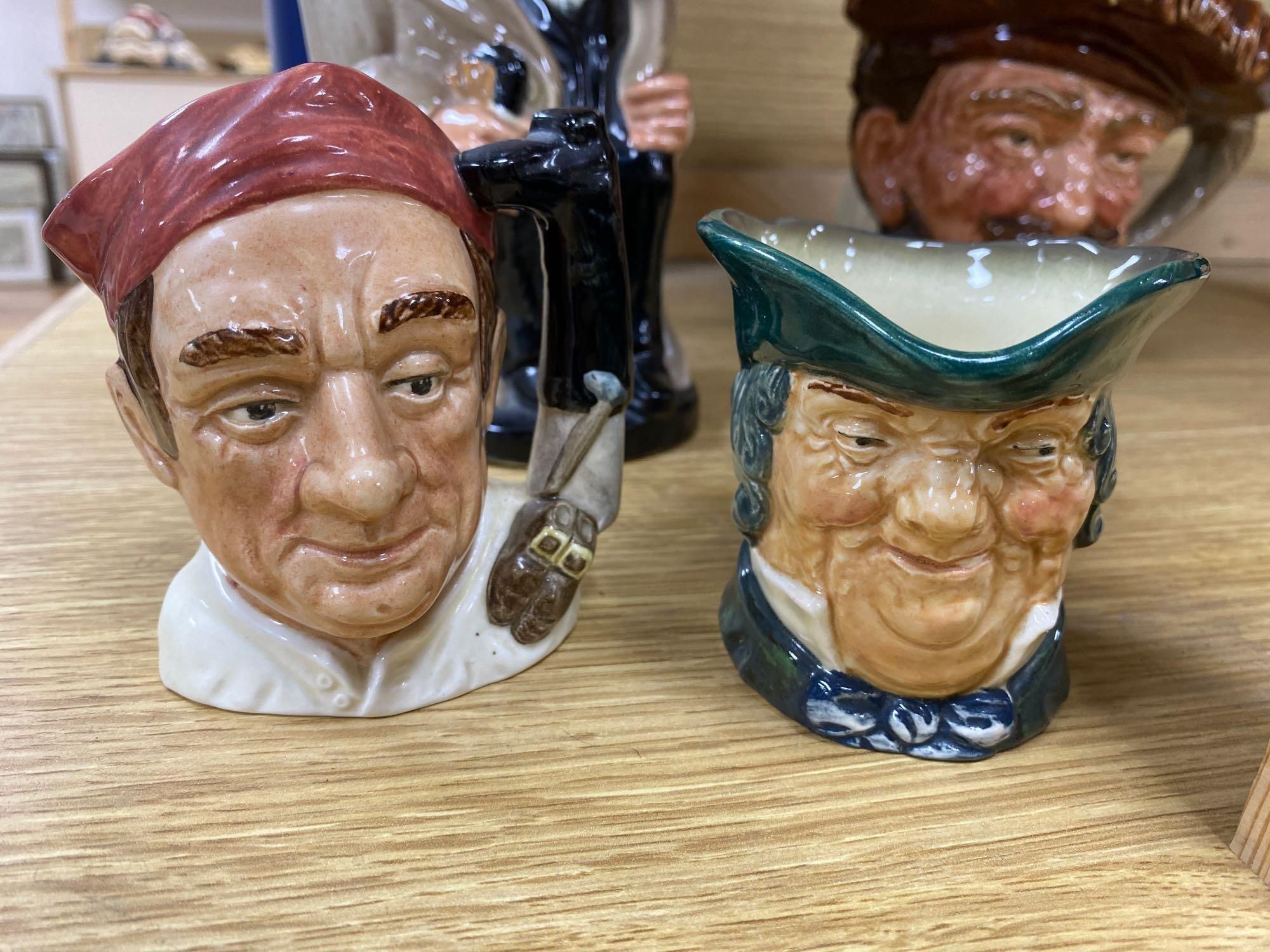 Twelve Royal Doulton character mugs and a Toby jug , Winston Churchill